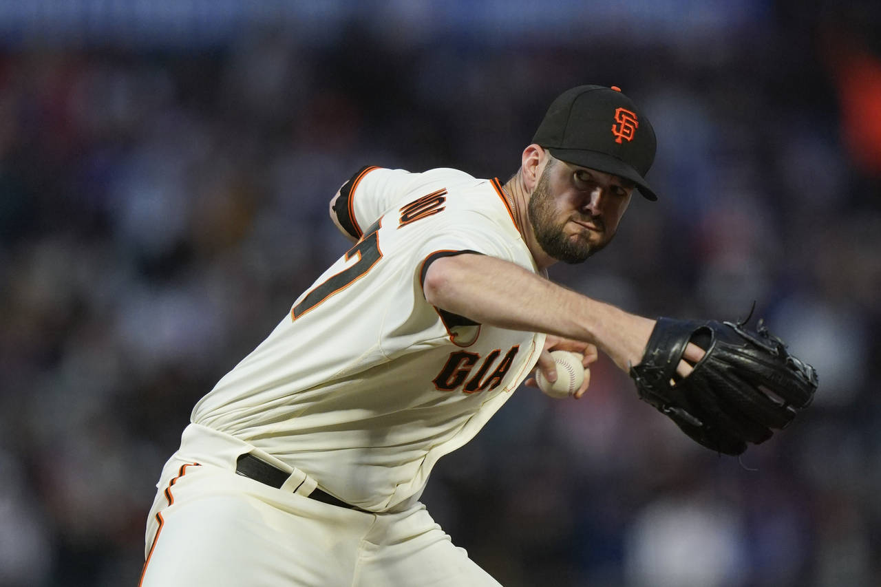 San Francisco Giants' Alex Wood pitches against the Chicago Cubs during the fifth inning of a baseb...
