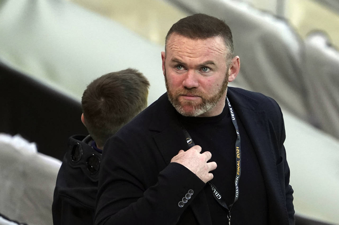 FILE - Former Manchester United player Wayne Rooney attends the Europa League final soccer match be...