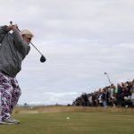 
              John Daly of the US plays from the 4th tee during the first round of the British Open golf championship on the Old Course at St. Andrews, Scotland, Thursday, July 14 2022. The Open Championship returns to the home of golf on July 14-17, 2022, to celebrate the 150th edition of the sport's oldest championship, which dates to 1860 and was first played at St. Andrews in 1873. (AP Photo/Peter Morrison)
            