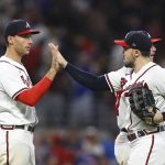 
              Atlanta Braves first baseman Matt Olson, left, and outfielder Adam Duvall, who both had two-run home runs in the game, give each other a high five while celebrating beating the New York Mets in a baseball game on Tuesday, July 12, 2022, in Atlanta. (Curtis Compton/Atlanta Journal-Constitution via AP)
            