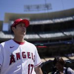 
              Los Angeles Angels' Shohei Ohtani enters the field during batting practice a day before the 2022 MLB All-Star baseball game, Monday, July 18, 2022, in Los Angeles. (AP Photo/Jae C. Hong)
            