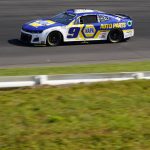 
              Chase Elliott drives through Turn 1 during the NASCAR Cup Series auto race at Pocono Raceway, Sunday, July 24, 2022, in Long Pond, Pa. (AP Photo/Matt Slocum)
            