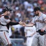
              San Francisco Giants starting pitcher Carlos Rodon, right, celebrates with catcher Austin Wynns after they defeated the San Diego Padres in a baseball game Saturday, July 9, 2022, in San Diego. (AP Photo/Derrick Tuskan)
            