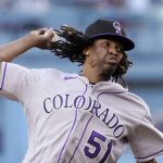 
              Colorado Rockies starting pitcher Jose Urena throws to the plate during the first inning of a baseball game against the Los Angeles Dodgers Wednesday, July 6, 2022, in Los Angeles. (AP Photo/Mark J. Terrill)
            