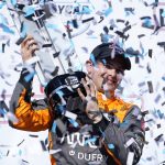 
              Pato O'Ward, of Mexico, celebrates after winning an IndyCar Series auto race, Sunday, July 24, 2022, at Iowa Speedway in Newton, Iowa. (AP Photo/Charlie Neibergall)
            