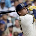 
              Milwaukee Brewers' Luis Urias hits a two-run home run during the fifth inning of a baseball game against the Minnesota Twins, Wednesday, July 27, 2022, in Milwaukee. (AP Photo/Aaron Gash)
            