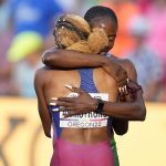
              Tobi Amusan, of Nigeria, embraces Alia Armstrong, of the United States, after the women's 100-meter hurdles final at the World Athletics Championships on Sunday, July 24, 2022, in Eugene, Ore. Amusan, won a gold medal in the event. (AP Photo/Ashley Landis)
            