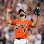 
              Baltimore Orioles relief pitcher Jorge Lopez reacts after recording a save against the Los Angeles Angels during a baseball game, Saturday, July 9, 2022, in Baltimore. The Orioles won 1-0. (AP Photo/Julio Cortez)
            