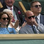 
              Britain's Prince William and Kate, Duchess of Cambridge smile as they sit in the Royal box on Centre Court as they watch the men's singles quarterfinal match between Serbia's Novak Djokovic and Italy's Jannik Sinner on day nine of the Wimbledon tennis championships in London, Tuesday, July 5, 2022. (AP Photo/Alastair Grant)
            