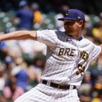 
              Milwaukee Brewers' Eric Lauer throws during the first inning of a baseball game against the Pittsburgh Pirates Sunday, July 10, 2022, in Milwaukee. (AP Photo/Morry Gash)
            