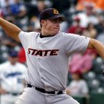 
              FILE - Oklahoma State's Oliver Odle pitches in the ninth inning of Oklahoma State's 6-4 win over Creighton in an NCAA regional baseball tournament game in Fayetteville, Ark., Friday, June 1, 2007. Major League Baseball agreed to pay minor leaguers $185 million  to settle a federal lawsuit alleging violations of minimum wage laws, a case that progressed through the courts for eight years without reaching a trial. The suit was filed in 2014 by Odle and two other players. (AP Photo/April L. Brown, File)
            