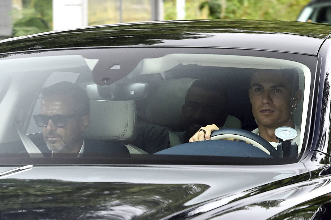 Manchester United's Cristiano Ronaldo arrives at Carrington Training Ground, Manchester, England, T...