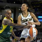 
              Seattle Storm's Epiphanny Prince, left, strips Chicago Sky's Rebekah Gardner of the ball during the first half of a WNBA basketball game Wednesday, July 20, 2022, in Chicago. (AP Photo/Charles Rex Arbogast)
            