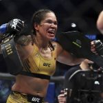 
              Amanda Nunes reacts after defeating Julianna Pena in a mixed martial arts women's bantamweight title bout at UFC 277 on Saturday, July 30, 2022, in Dallas. (AP Photo/Richard W. Rodriguez)
            