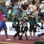 
              Fred Kerley, of the United States, celebrates after winning the final in the men's 100-meter run at the World Athletics Championships on Saturday, July 16, 2022, in Eugene, Ore.(AP Photo/Ashley Landis)
            