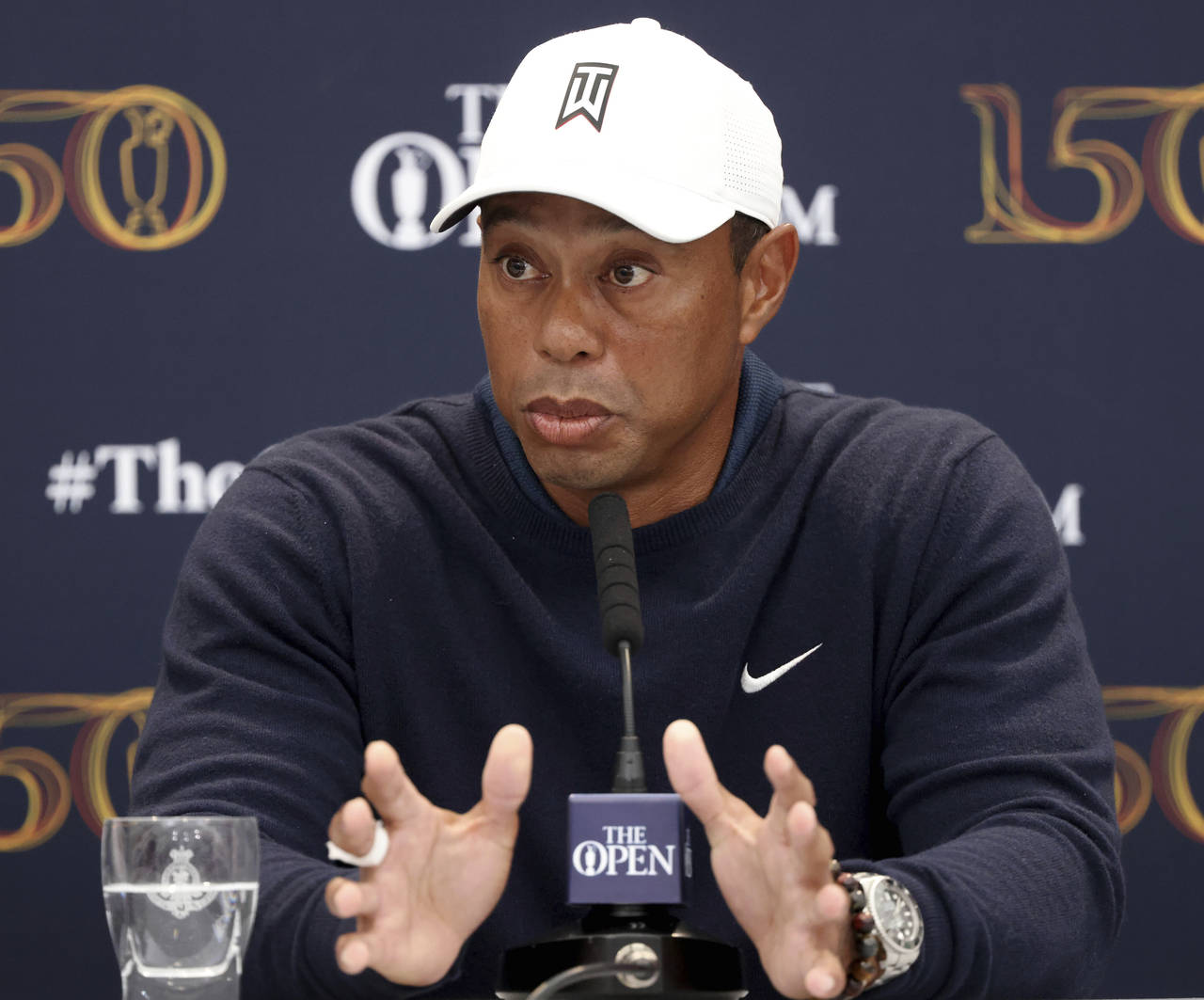 US golfer Tiger Woods speaks during a press conference at the British Open golf championship in St ...