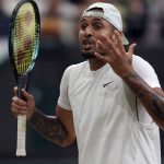 
              Australia's Nick Kyrgios reacts during his third round men's singles match against Greece's Stefanos Tsitsipas on day six of the Wimbledon tennis championships in London, Saturday, July 2, 2022. (AP Photo/Kirsty Wigglesworth)
            