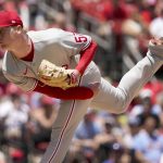 
              Philadelphia Phillies starting pitcher Nick Nelson throws during the first inning of a baseball game against the St. Louis Cardinals Sunday, July 10, 2022, in St. Louis. (AP Photo/Jeff Roberson)
            