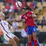 
              Costa Rica's Carol Sanchez (6) heads the ball past United States' Lindsey Horan during a CONCACAF Women's Championship soccer semifinal match in Monterrey, Mexico, Thursday, July 14, 2022. (AP Photo/Fernando Llano)
            