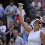 
              Amanda Anisimova of the US celebrates after beating France's Harmony Tan in a women's fourth round singles match on day eight of the Wimbledon tennis championships in London, Monday, July 4, 2022. (AP Photo/Alastair Grant)
            