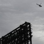 
              A Chicago Police helicopter flies over Guaranteed Rate Field after a Fourth of July parade shooting in nearby Highland Park, Ill., Monday, July 4, 2022, in Chicago before a baseball game between the Chicago White Sox and the Minnesota Twins. (AP Photo/Paul Beaty)
            