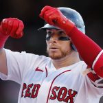 
              Boston Red Sox's Christian gestures after hitting an RBI single during the seventh inning of the team's baseball game against the Milwaukee Brewers, Saturday, July 30, 2022, in Boston. (AP Photo/Michael Dwyer)
            