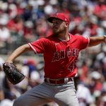 
              Los Angeles Angels' Reid Detmers pitches against the Atlanta Braves during the first inning of a baseball game Sunday, July 24, 2022, in Atlanta. (AP Photo/Butch Dill)
            