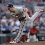 
              Washington Nationals pitcher Erick Fedde works against the Atlanta Braves during the first inning of a baseball game Friday, July 8, 2022, in Atlanta. (AP Photo/Ben Margot)
            