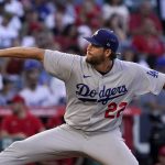 
              Los Angeles Dodgers starting pitcher Clayton Kershaw throws to the plate during the second inning of a baseball game against the Los Angeles Angels Friday, July 15, 2022, in Anaheim, Calif. (AP Photo/Mark J. Terrill)
            