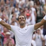 
              Spain's Rafael Nadal celebrates after beating Taylor Fritz of the US in a men's singles quarterfinal match on day ten of the Wimbledon tennis championships in London, Wednesday, July 6, 2022. (AP Photo/Kirsty Wigglesworth)
            