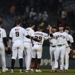 
              San Francisco Giants celebrate a 4-2 win against the Chicago Cubs in a baseball game in San Francisco, Thursday, July 28, 2022. (AP Photo/Godofredo A. Vásquez)
            