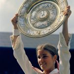 
              FILE - Chris Evert holds up her trophy after winning the Women's singles title at the Wimbledon tennis championships in London on July 7, 1974. (AP Photo, File)
            