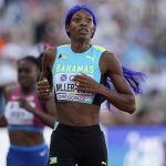 
              Shaunae Miller-Uibo, of Bahamas, wins in a the semifinal of the women's 400-meter run at the World Athletics Championships on Wednesday, July 20, 2022, in Eugene, Ore. (AP Photo/Ashley Landis)
            