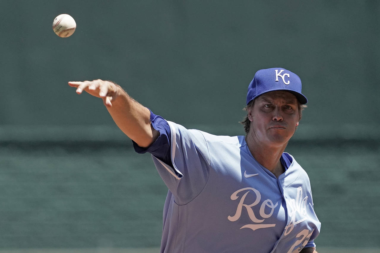 Kansas City Royals starting pitcher Zack Greinke throws during the first inning of a baseball game ...