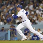 
              Los Angeles Dodgers' Freddie Freeman (5) runs to first on a single during the seventh inning of a baseball game against the Chicago Cubs in Los Angeles, Saturday, July 9, 2022. Cody Bellinger and Austin Barnes scored. (AP Photo/Ashley Landis)
            
