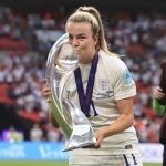 
              England's Lauren Hemp poses kissing the trophy after the Women's Euro 2022 final soccer match between England and Germany at Wembley stadium in London, Sunday, July 31, 2022. (AP Photo/Leila Coker)
            