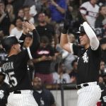 
              Chicago White Sox's Gavin Sheets, right, celebrates with Andrew Vaughn, his two-run home run off Oakland Athletics relief pitcher Austin Pruitt during the seventh inning of a baseball game Saturday, July 30, 2022, in Chicago. (AP Photo/Charles Rex Arbogast)
            