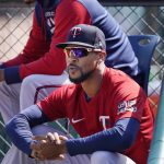 
              Minnesota Twins' Byron Buxton watches from the dugout during the seventh inning of a baseball game against the Detroit Tigers, Sunday, July 24, 2022, in Detroit. (AP Photo/Carlos Osorio)
            