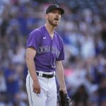 
              Colorado Rockies starting pitcher Chad Kuhl reacts after giving up a two-run home run to Los Angeles Dodgers' Will Smith during the first inning of a baseball game Friday, July 29, 2022, in Denver. (AP Photo/David Zalubowski)
            