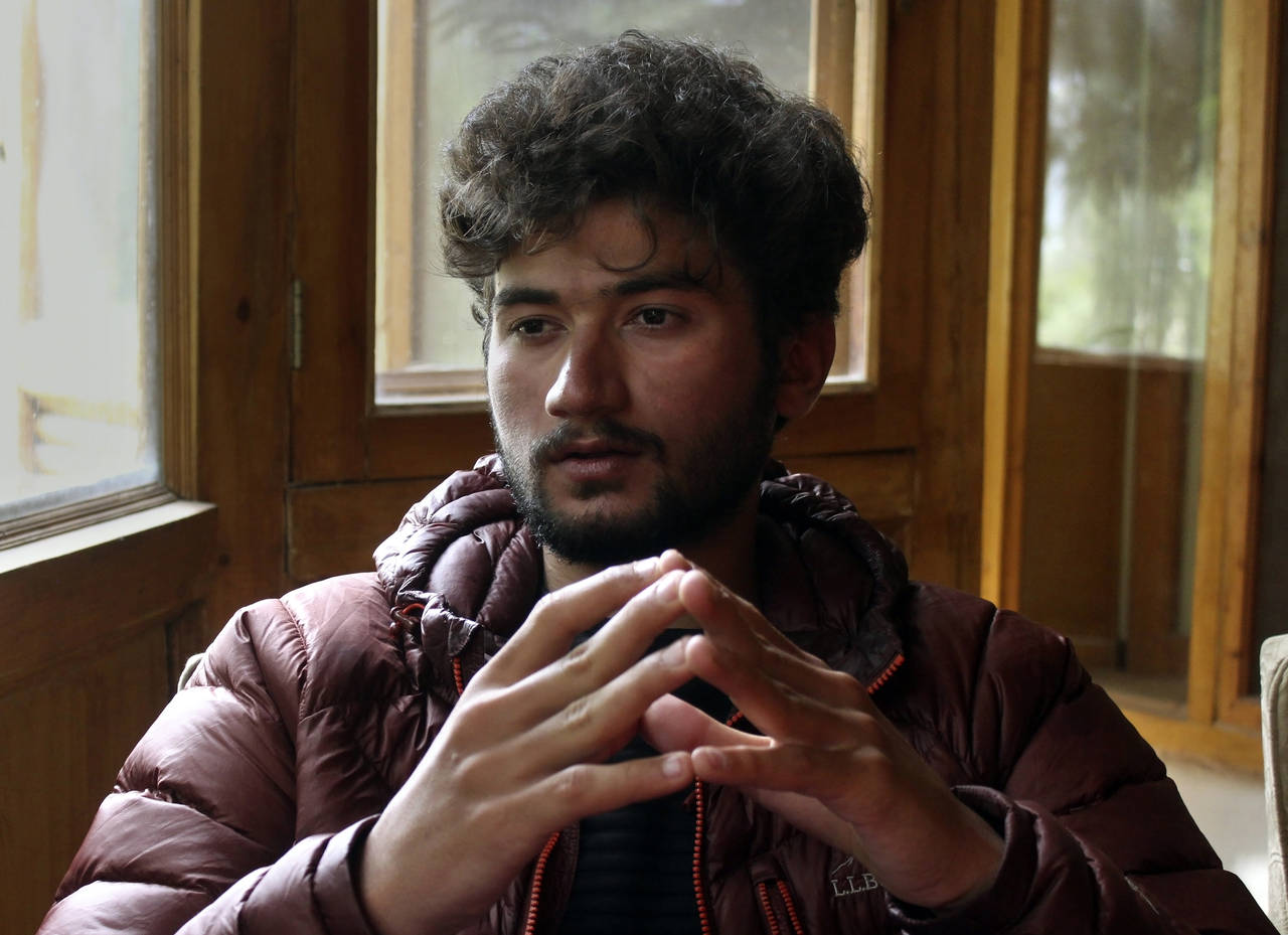 FILE - Pakistani mountain climber Shehroz Kashif, 19, gives an interview to The Associated Press, i...