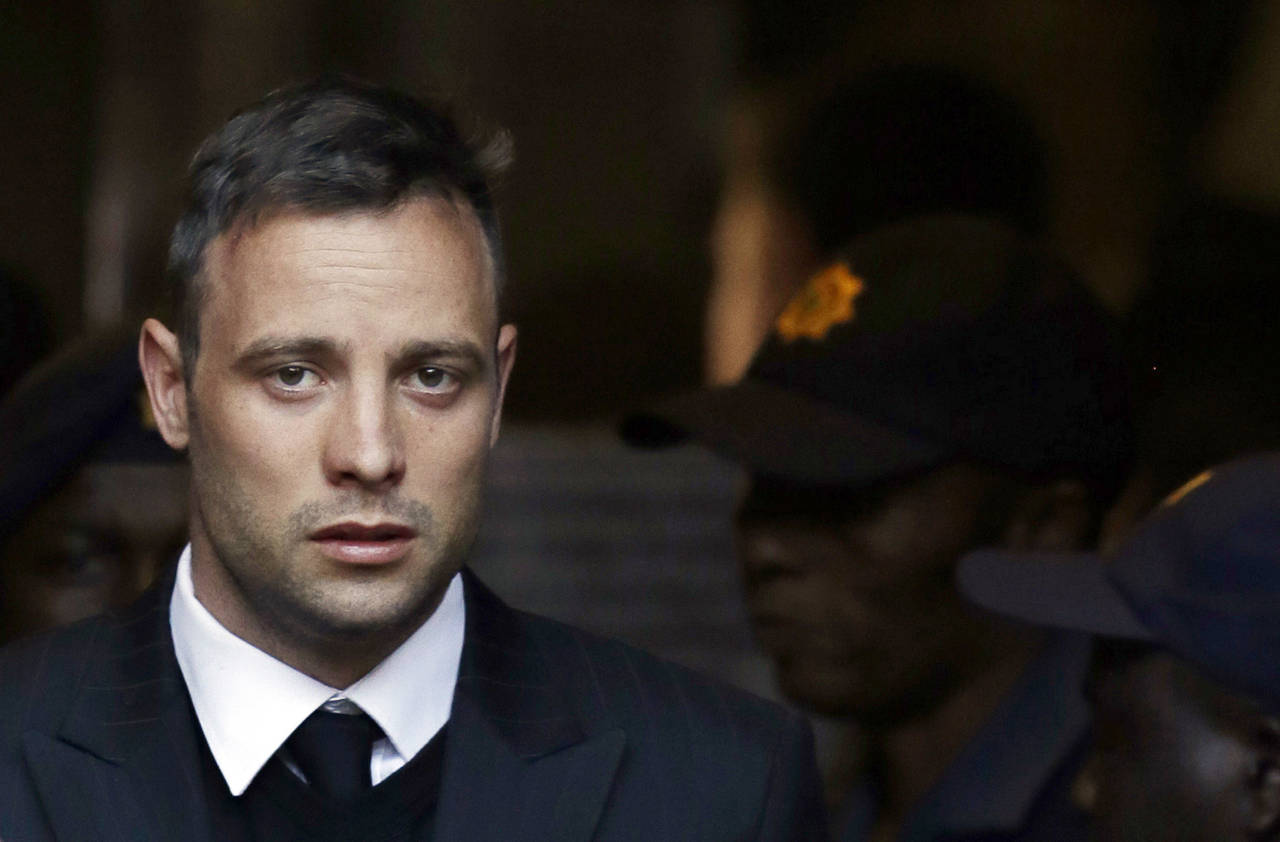 FILE - In this Wednesday, June 15, 2016, file photo, Oscar Pistorius leaves the High Court in Preto...