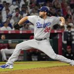 
              Los Angeles Dodgers starting pitcher Clayton Kershaw throws to the plate during the seventh inning of a baseball game against the Los Angeles Angels Friday, July 15, 2022, in Anaheim, Calif. (AP Photo/Mark J. Terrill)
            
