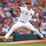 
              Cincinnati Reds' Mike Minor throws during the first inning the team's baseball game against the Atlanta Braves in Cincinnati, Friday, July 1, 2022. (AP Photo/Aaron Doster)
            