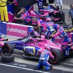 
              Alexander Rossi makes a pit stop during the running of an IndyCar auto race at the Indianapolis Motor Speedway in Indianapolis, Saturday, July 30, 2022. (AP Photo/AJ Mast)
            