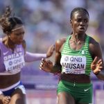 
              Tobi Amusan, of Nigeria, wins the women's 100-meter hurdles semifinal at the World Athletics Championships on Sunday, July 24, 2022, in Eugene, Ore. (AP Photo/Ashley Landis)
            