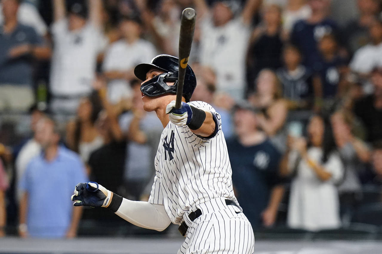 New York Yankees' Aaron Judge watches his game-ending home run during the ninth inning of the team'...