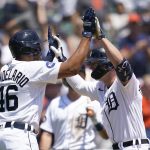 
              Detroit Tigers first baseman Spencer Torkelson, right, celebrates his two-run home run with Jeimer Candelario (46) in the fifth inning of a baseball game against the Kansas City Royals in Detroit, Sunday, July 3, 2022. (AP Photo/Paul Sancya)
            
