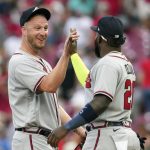 
              Atlanta Braves relief pitcher Will Smith, left, celebrates with Marcell Ozuna after defeating the Cincinnati Reds 4-1 in a baseball game Saturday, July 2, 2022, in Cincinnati. (AP Photo/Jeff Dean)
            