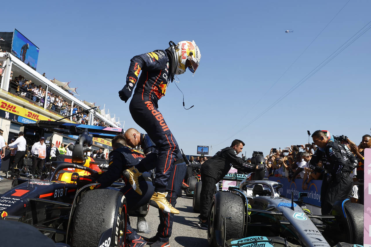 Red Bull driver Max Verstappen of the Netherlands celebrates after winning the French Formula One G...