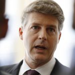 
              FILE - New York Yankees owner Hal Steinbrenner stops to talk to the media before attending a meeting of Major League Baseball's executive committee on May 18, 2016, in New York. Steinbrenner realizes there is a chance the price may be going up to sign Aaron Judge to a long-term contract after the star slugger’s outstanding first half. Judge turned down an eight-year contract worth $230.5 million to $234.5 million, cutting off talks ahead of the April 8 opener and saying he wouldn’t negotiate again until after the season. (AP Photo/Kathy Willens, File)
            